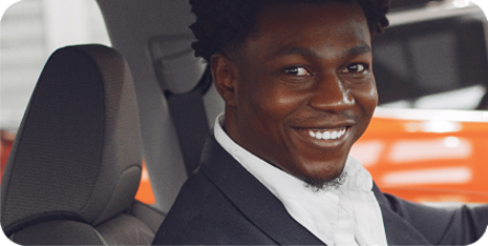 People talking near a car